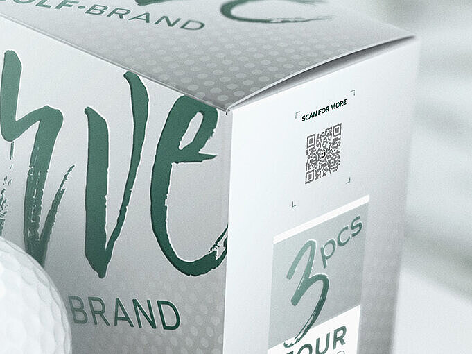 A box of “Verve Golf Brand” Tour Speed golf balls, displayed alongside a single white golf ball. The packaging features ValiGate® direct print technology, where the security feature is embedded directly into the QR code printed on the packaging. This allows for seamless product authentication and access to detailed product information while eliminating the need for additional labels, ensuring a secure and eco-friendly solution.